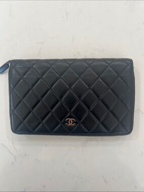 CHANEL Black Quilted Zip-Around Wallet with CC Logo